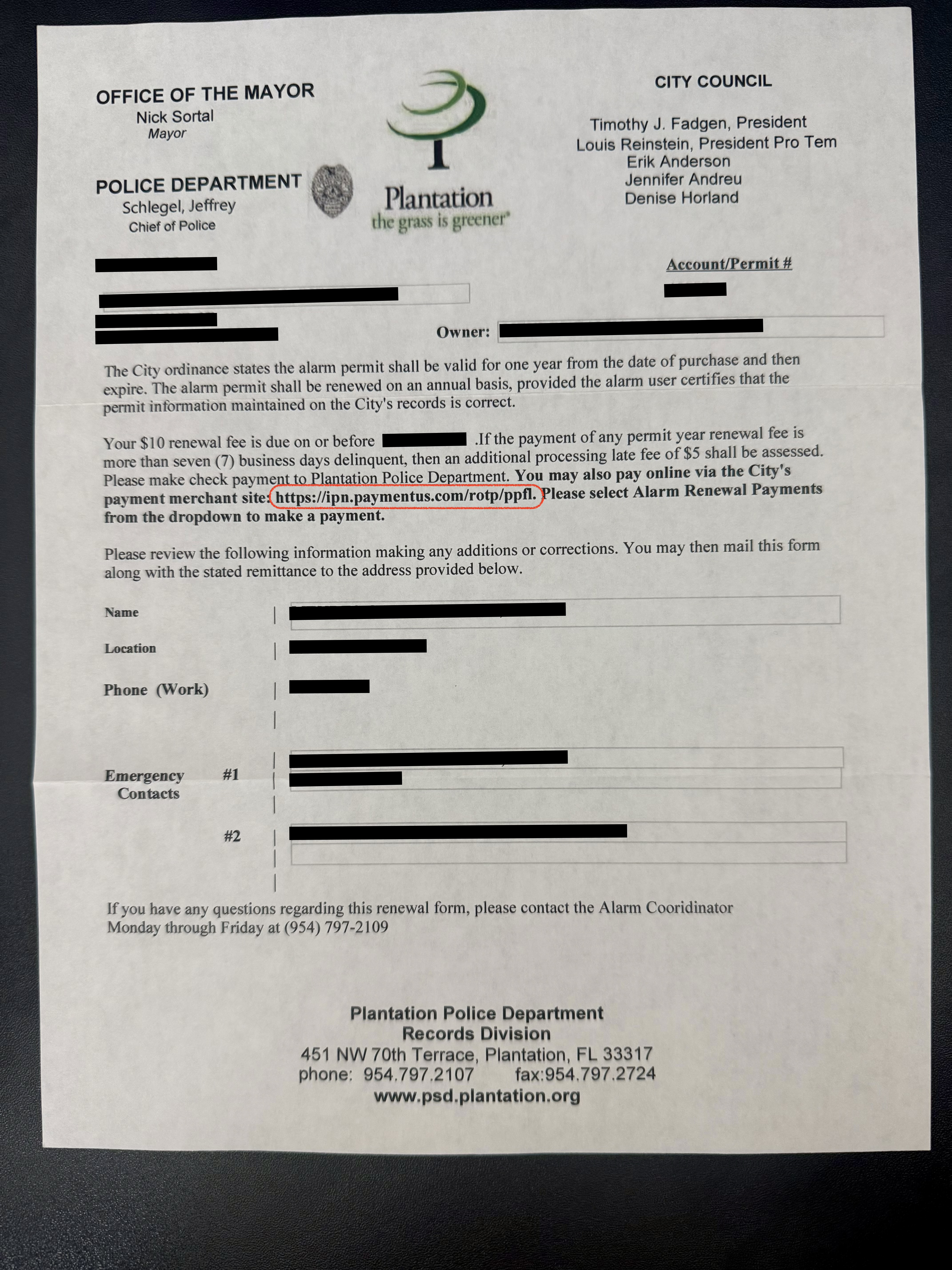 City of Plantation alarm permit renewal notice showing the incorrect payment URL