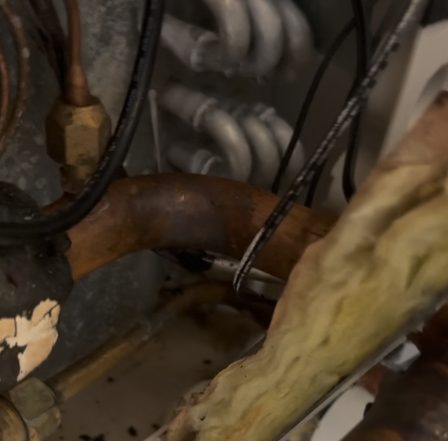 Copper refrigerant pipe showing the leak area inside the Lennox air handler